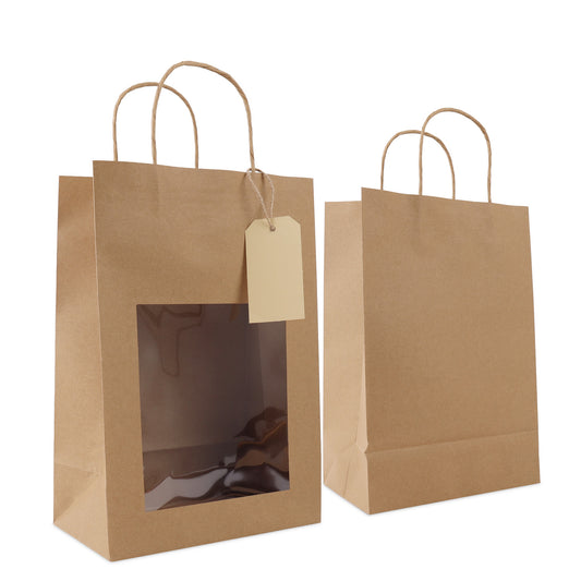 Twisted papieren cadeautasjes met venster en hangtags